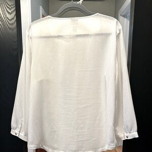 White blouse.  In great shape. No stains or tears.